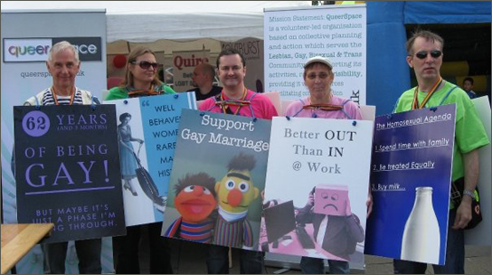 QueerSpace folk with our new sandwich boards at Pride Party in the Square, Saturday 2nd August 2008